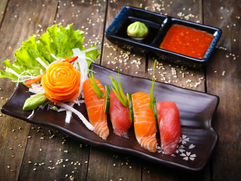 Japanese Salmon, tuna sushi and sauce closeup